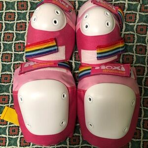 Moxie rainbow and pink skate pads for knees and elbows. Brand new, never worn